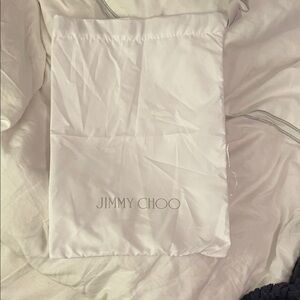 Jimmy Choo dust bag slight imperfection in bottom stitching
